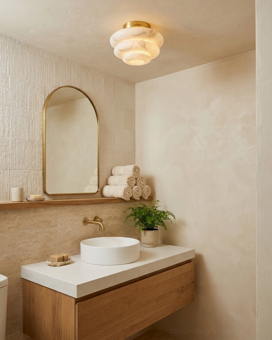 Alabaster flush mount installed in minimalist contemporary room with neutral palette and natural wood
