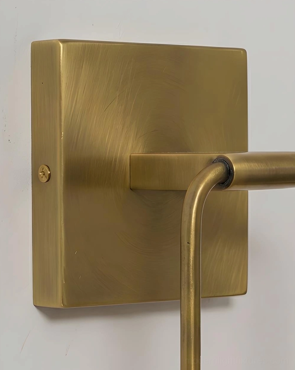 Alabaster brass wall sconce detail shot - natural stone veining texture and brushed brass hardware close-up