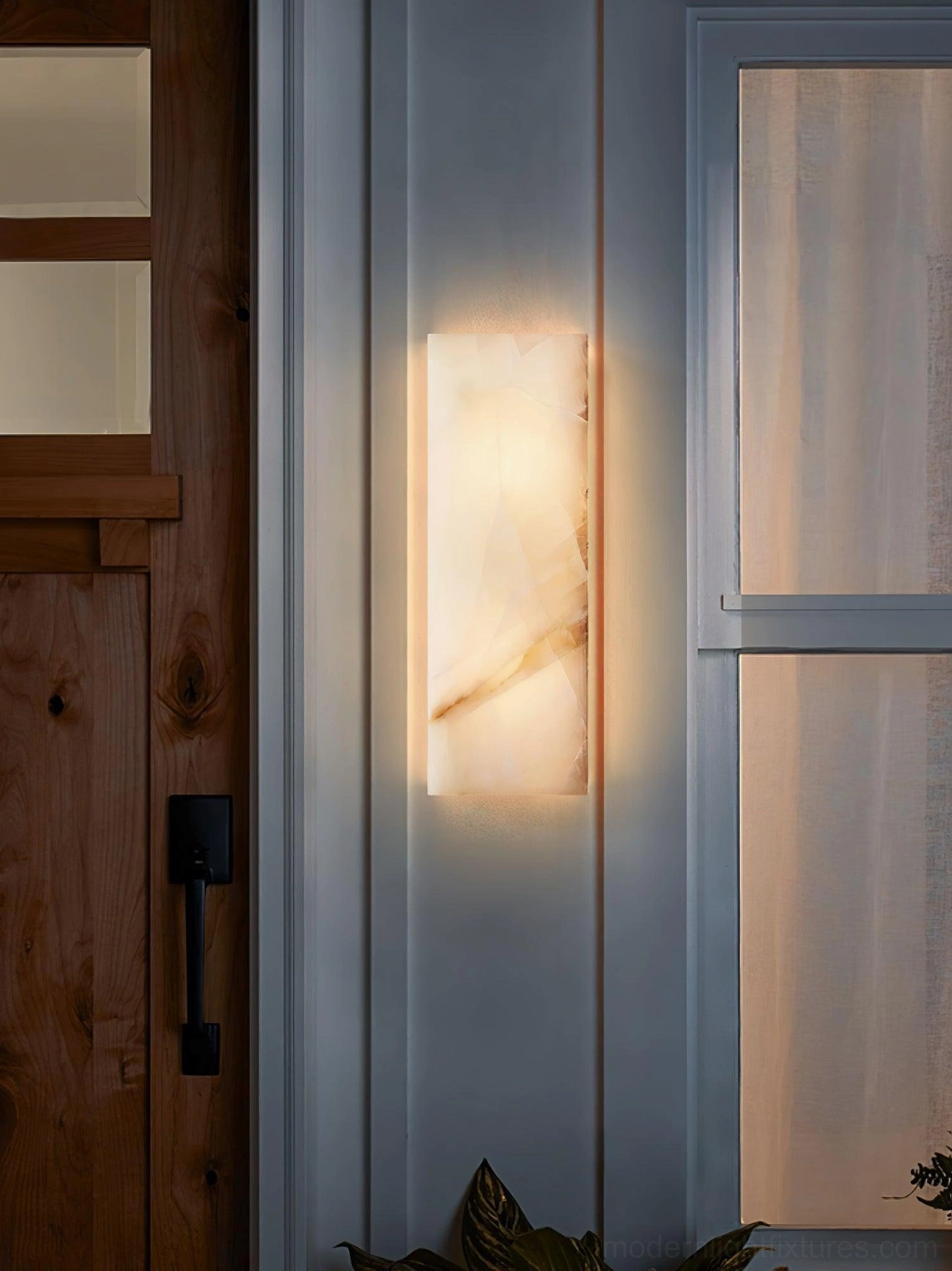 Modern alabaster wall sconce eye-level mounting hallway corridor ambient wall lighting feature