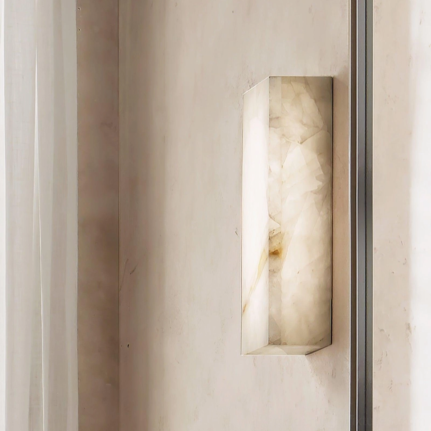 Alabaster wall sconce vertical mounting dramatic impact symmetric paired arrangement design