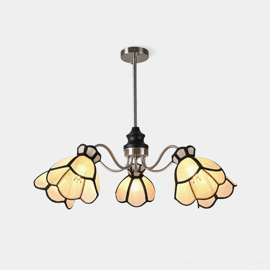 Alessio 5-head floral chandelier front view with beige flower shades and polished chrome metal frame against white background