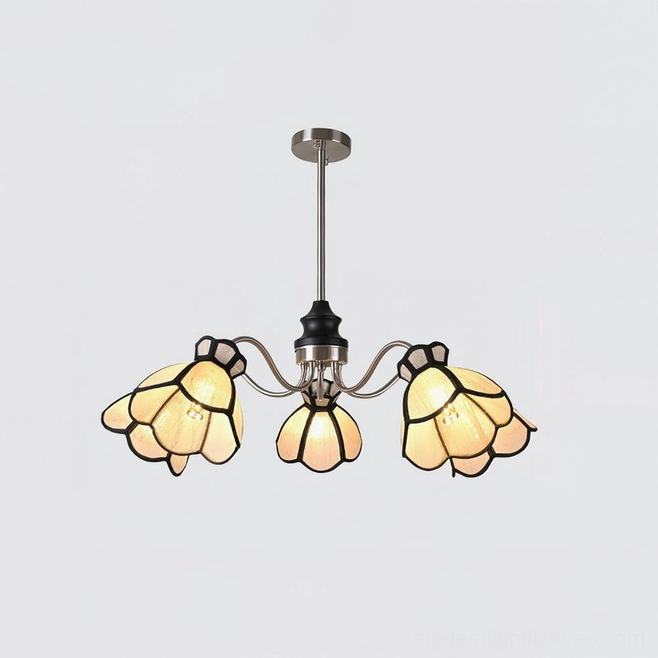 5-head flower chandelier close-up showing botanical shade texture and polished chrome metal construction