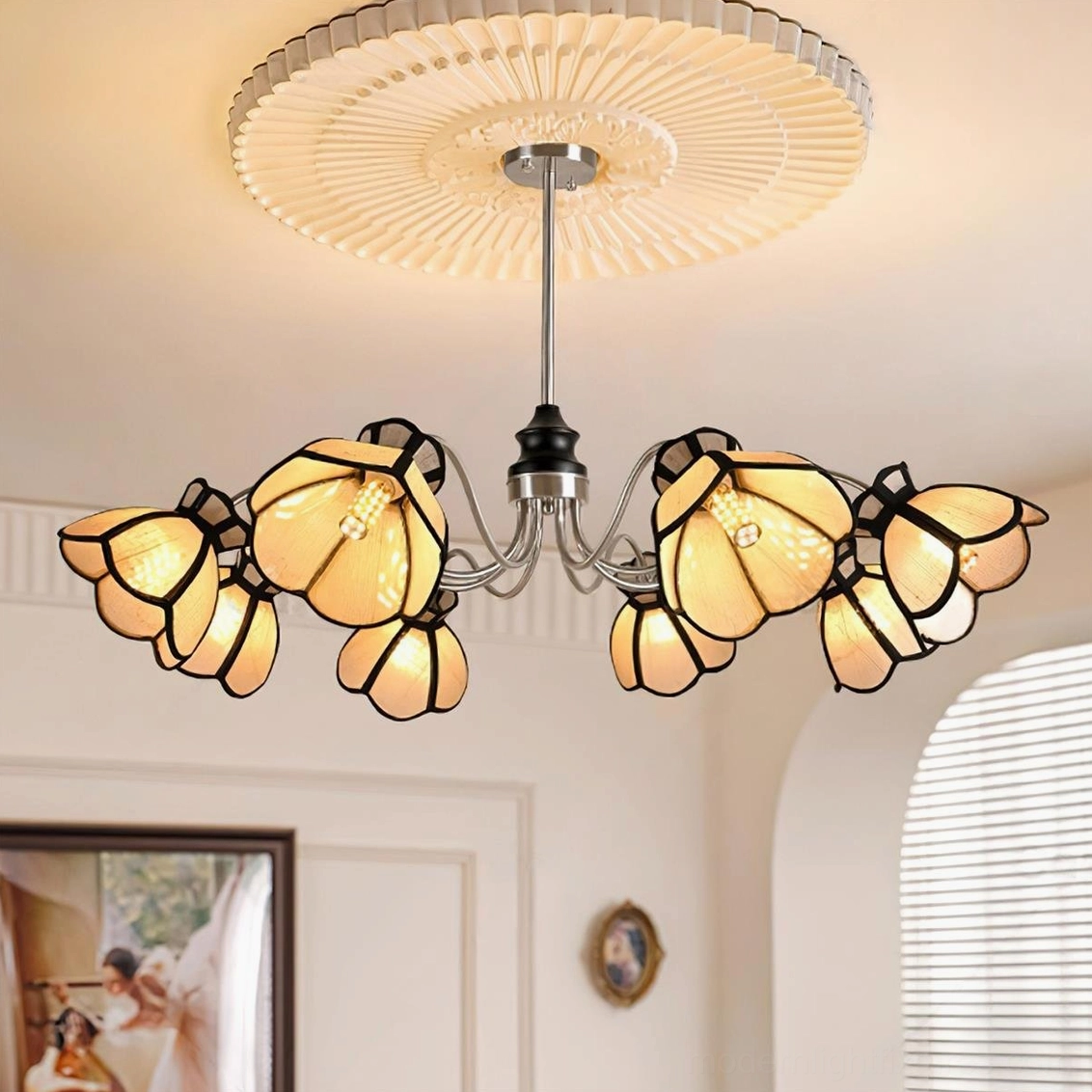 Multi-head flower chandelier showing detailed botanical shade design and chrome metal frame construction
