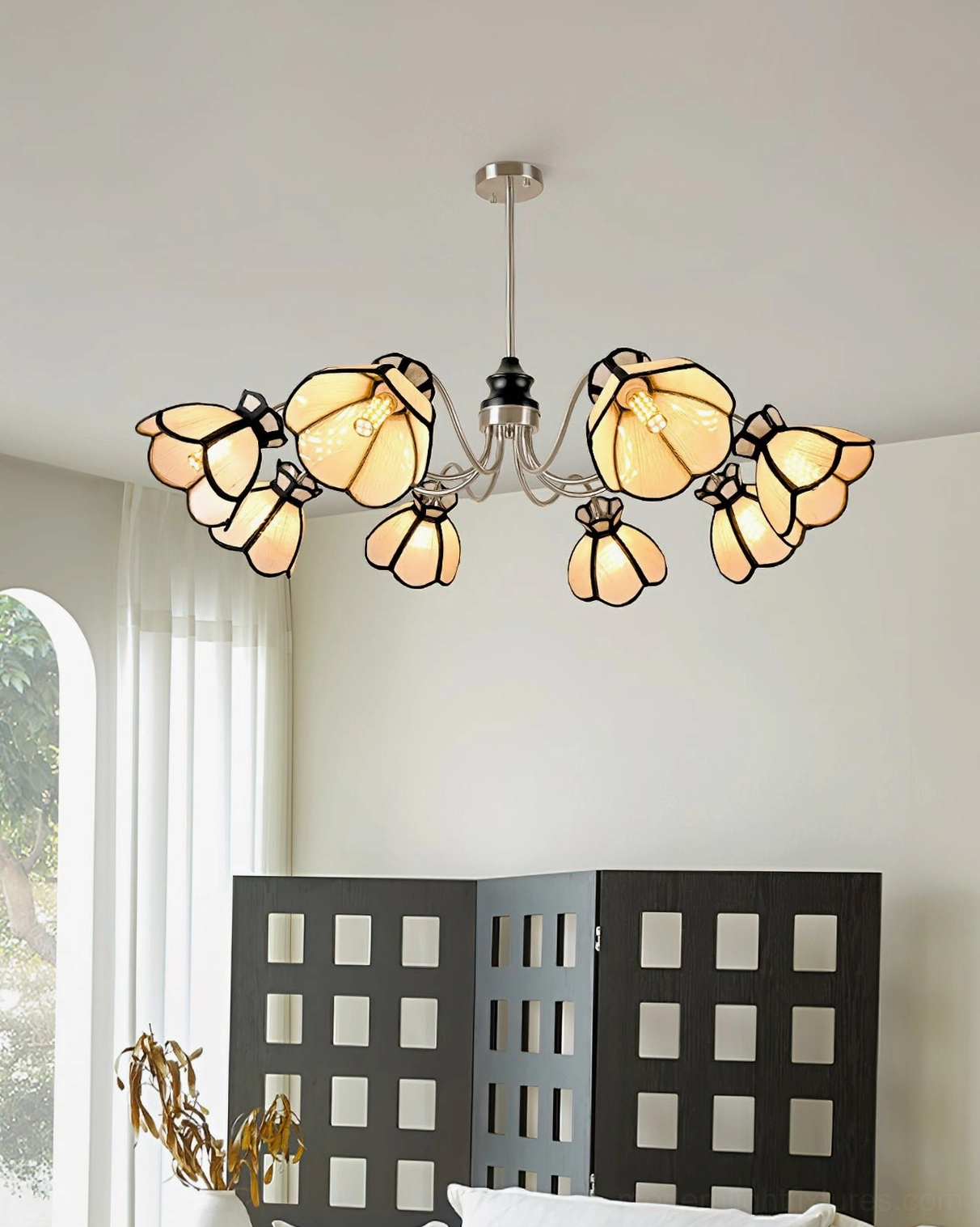 Floral chandelier close-up of flower shade details and metal frame craftsmanship