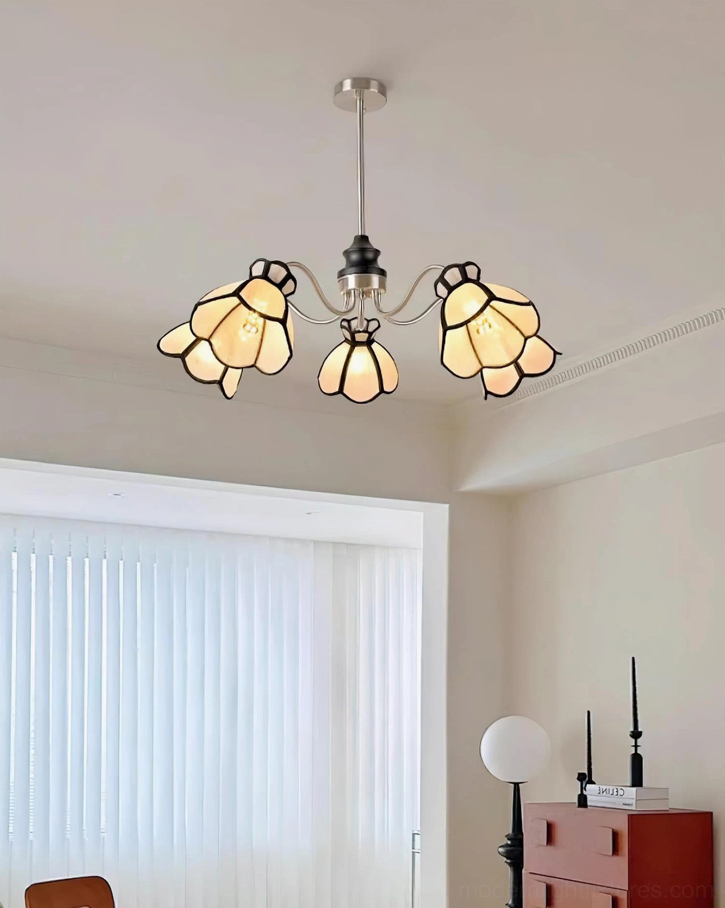 Flower pendant chandelier with polished chrome frame and warm diffused lighting ambiance