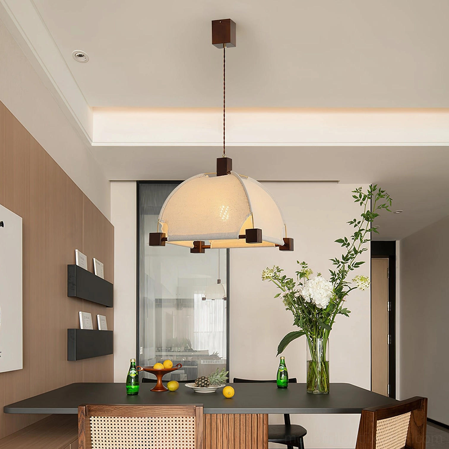 Contemporary fabric pendant light in Japanese-style dining room with natural wood accents