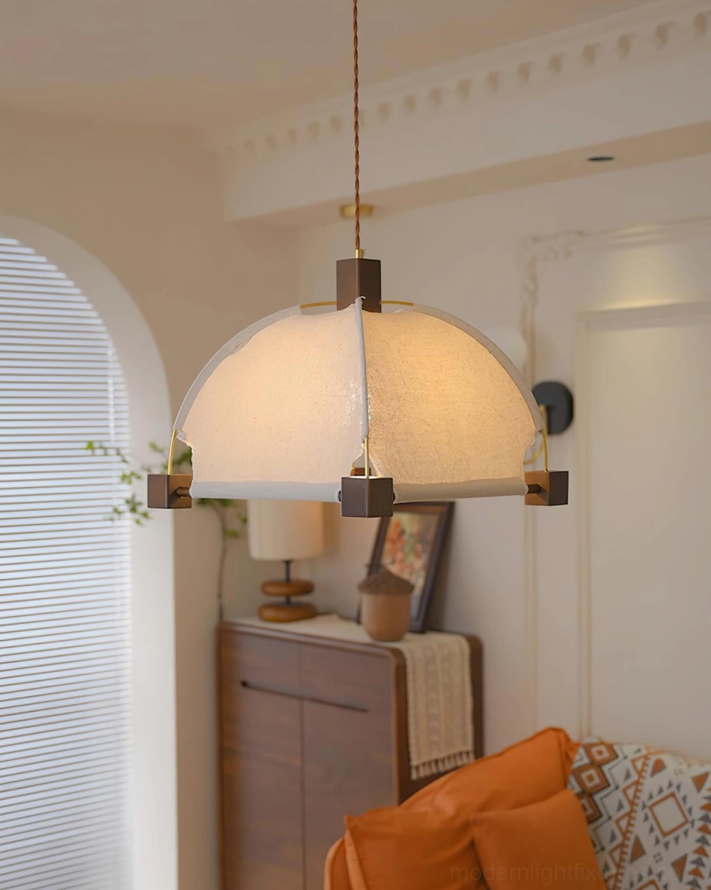 Warm ambient lighting from Allegra fabric pendant - soft glow for dining ambiance