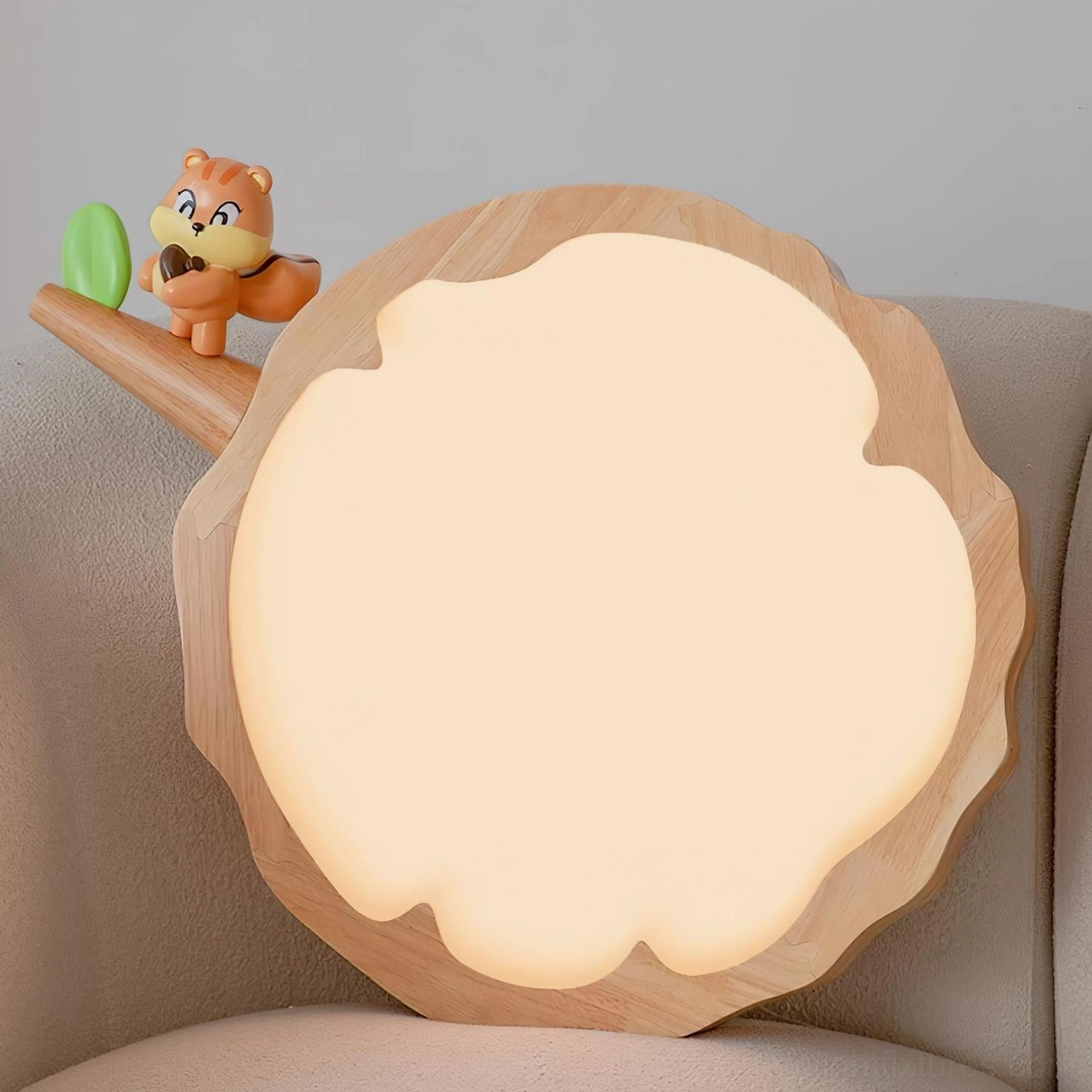 Alternative angle of handcrafted animal ceiling light fixture showing wood frame and creature detail