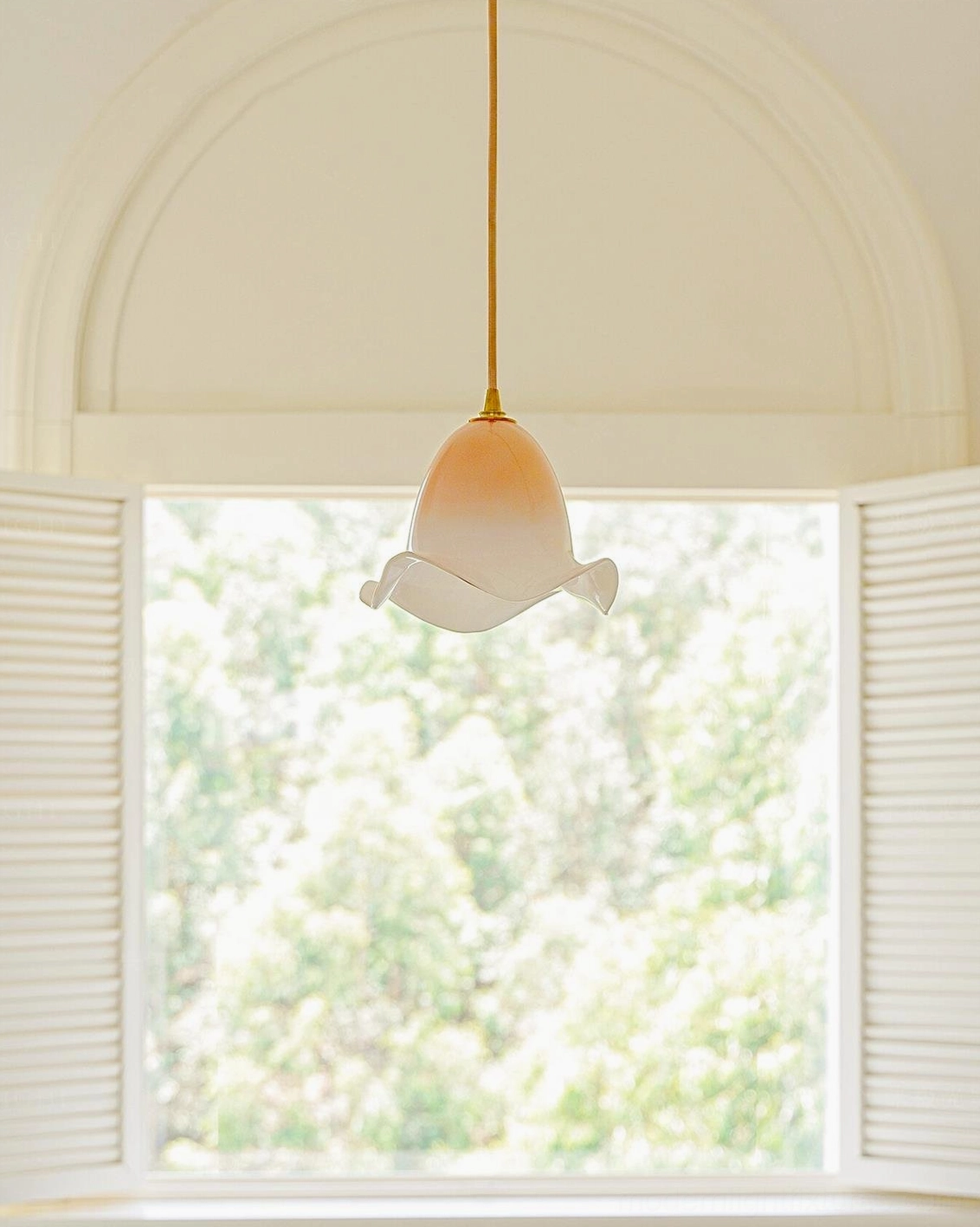 Aluna hand-blown glass pendant lamp close-up detail showing ruffled texture and gradient color variation