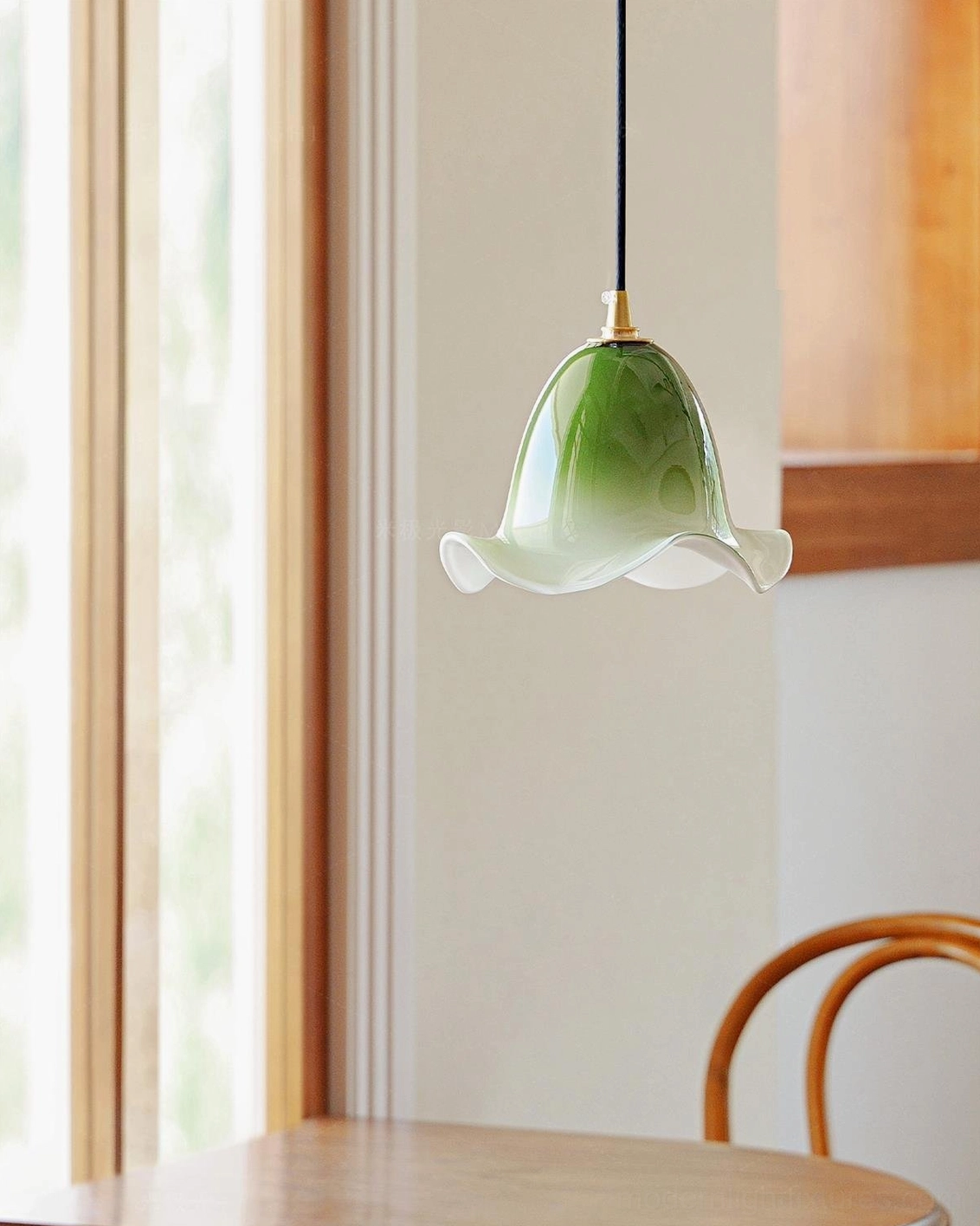Aluna organic glass pendant light multiple angles, showcasing hand-blown craftsmanship and brass accents