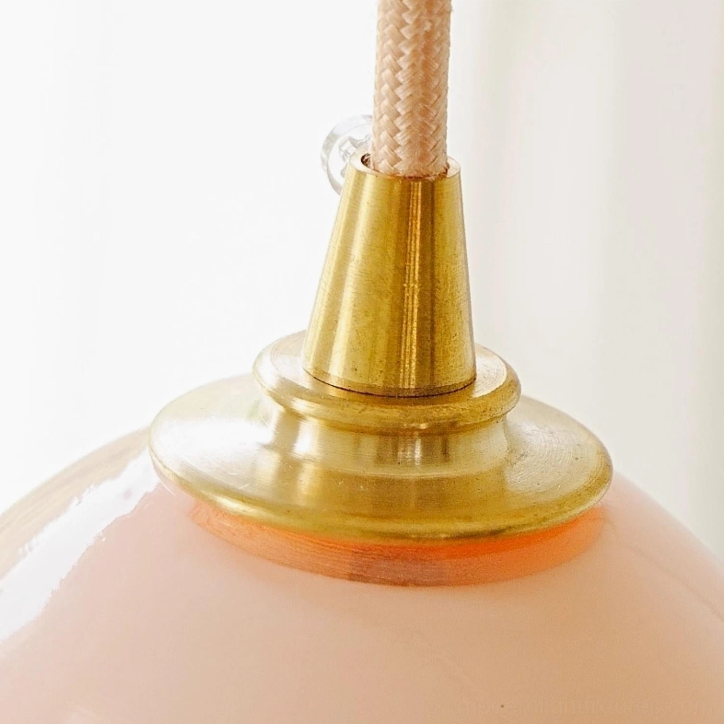 Aluna pendant light installed overhead view, demonstrating installation height and light distribution in room