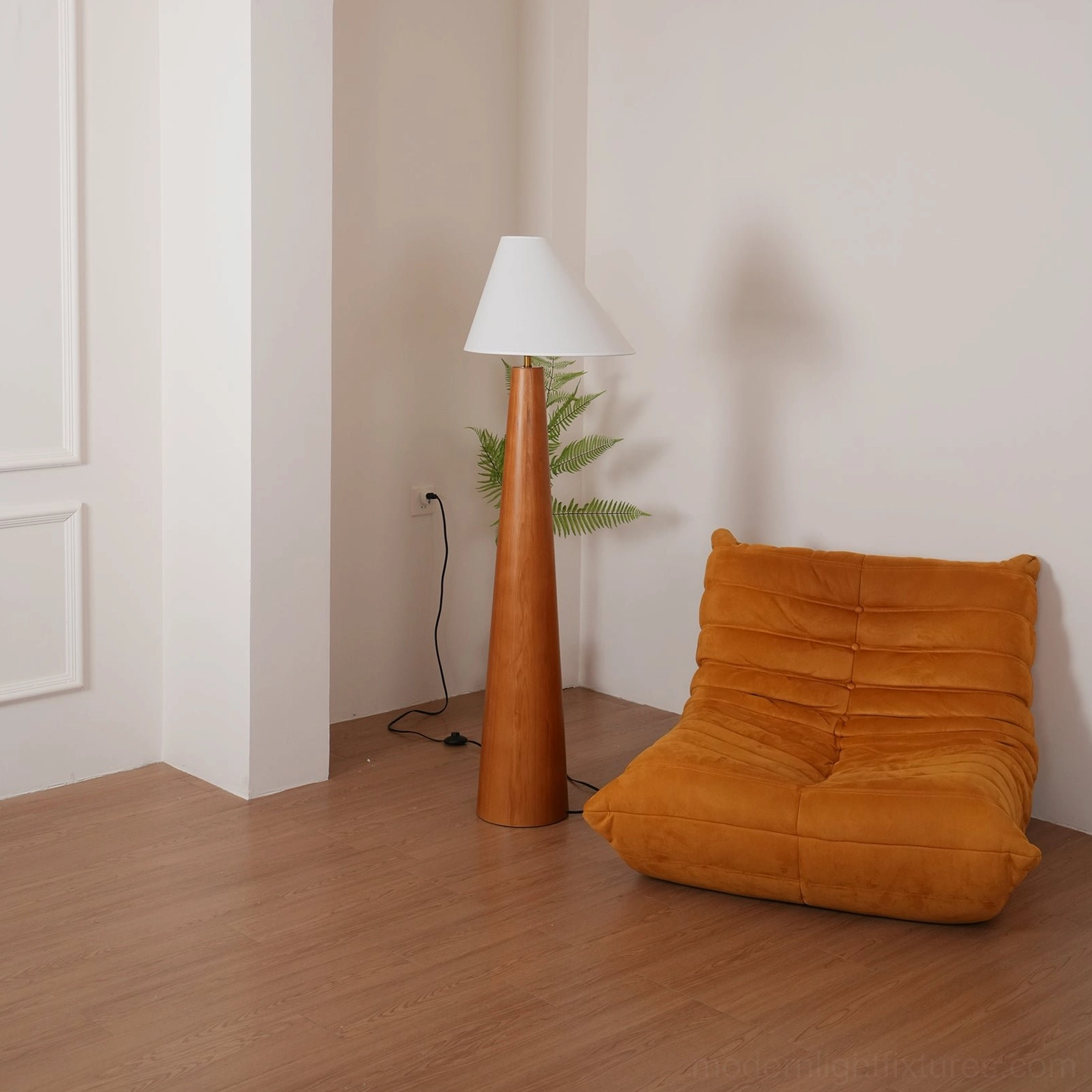 Alvin natural wood floor lamp with linen shade, detail view showing tapered wooden pole construction and base joint craftsmanship