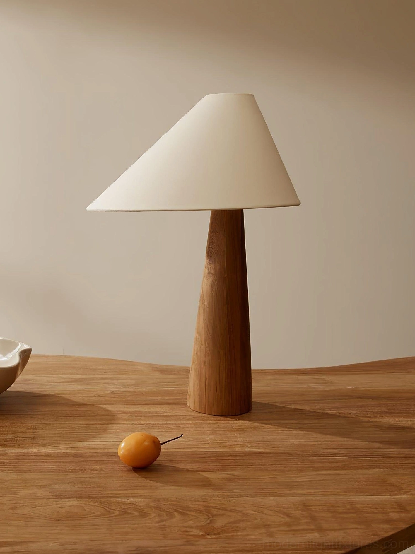 Alvin wooden table lamp with natural base displayed on dining table in wabi-sabi minimalist home decor