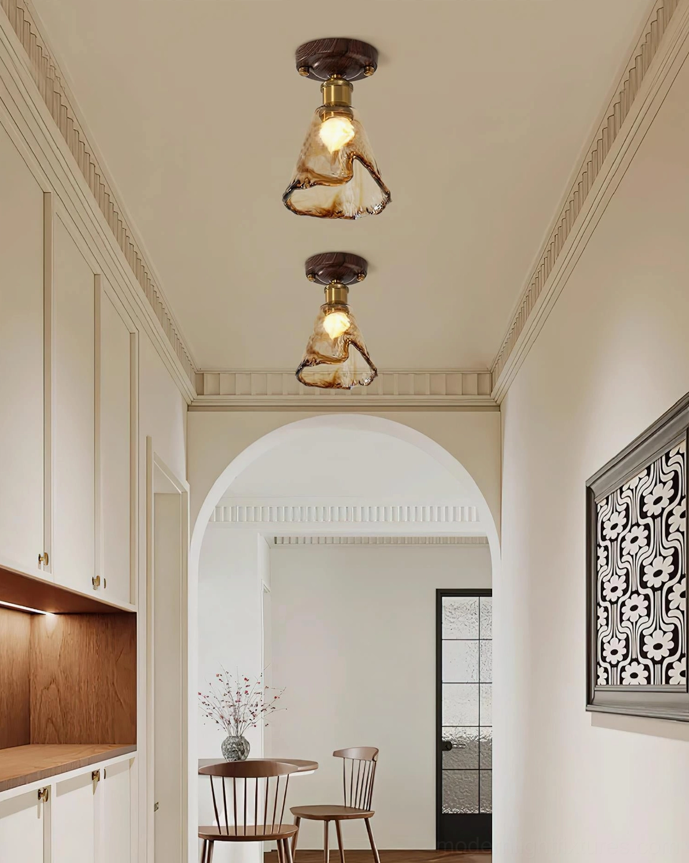 Amber glass flush mount ceiling light in transitional home interior with modern and rustic design elements