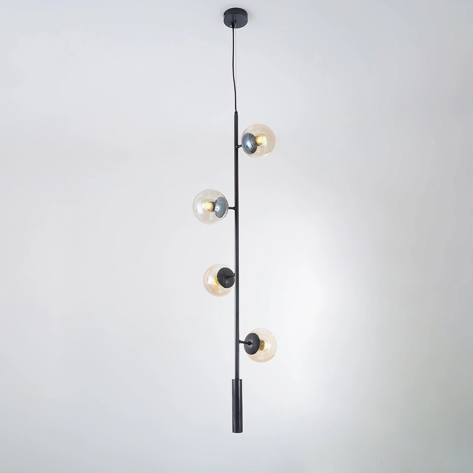 Amber glass orb chandelier providing warm illumination in contemporary home interior