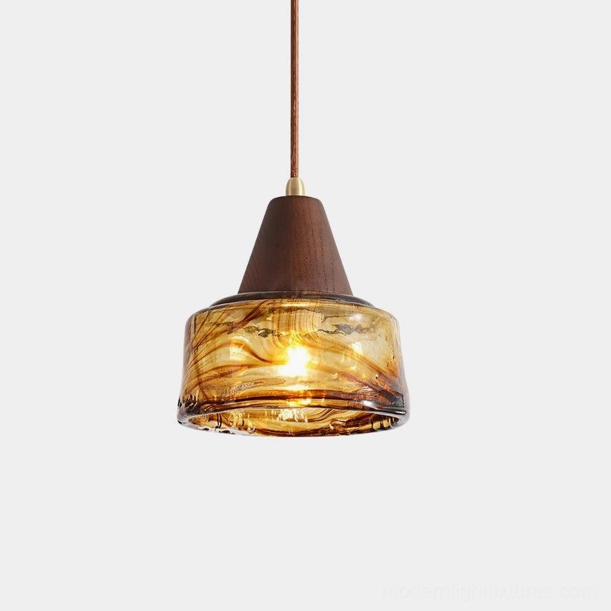 Vintage amber Murano hand-blown glass pendant light with brass fixture, close-up detail view