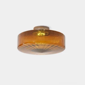 Amber Razia warm glow flush mount ceiling light, front studio view with ribbed amber glass diffuser