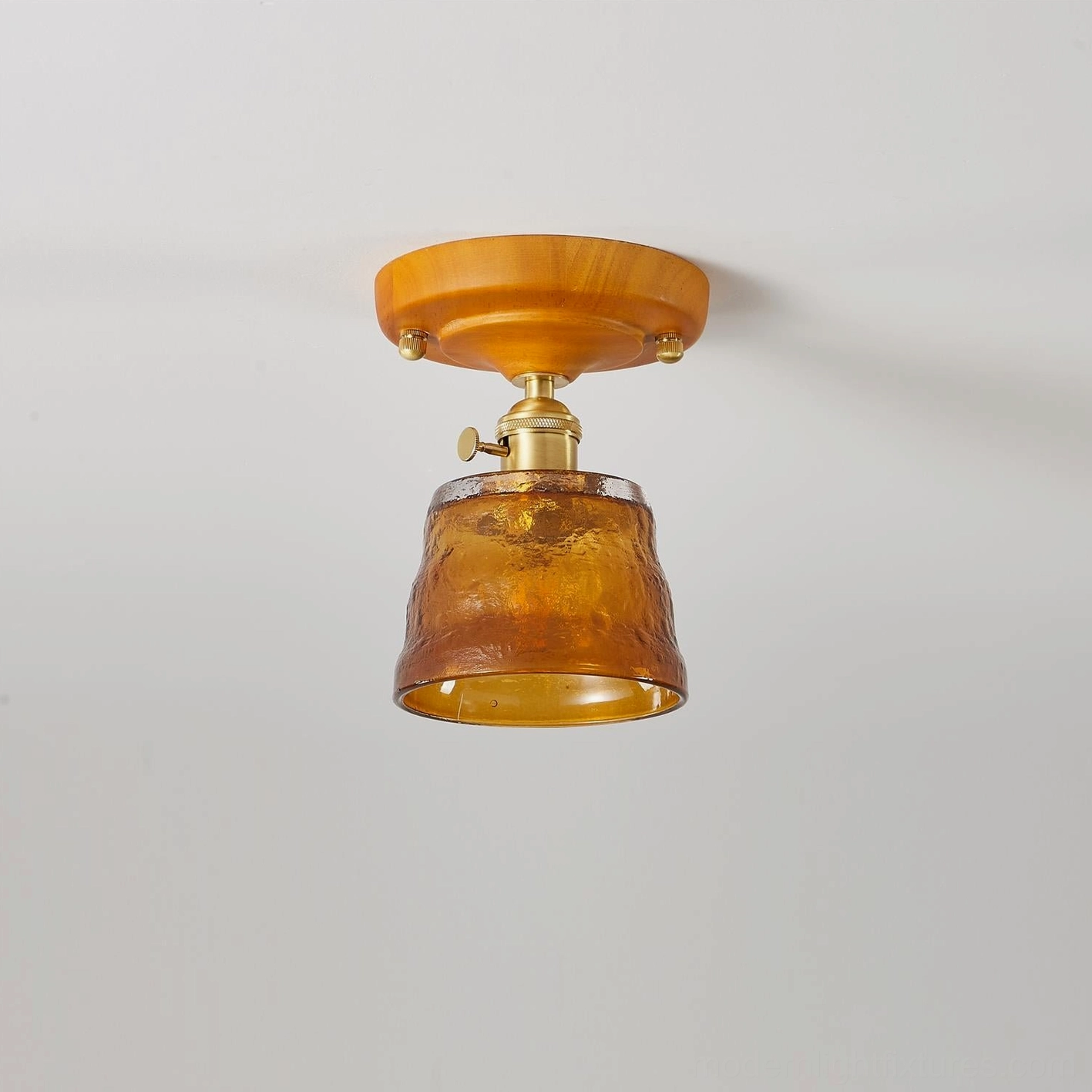 Amber vintage glass ceiling light Model B square tapered shade with brass base close-up