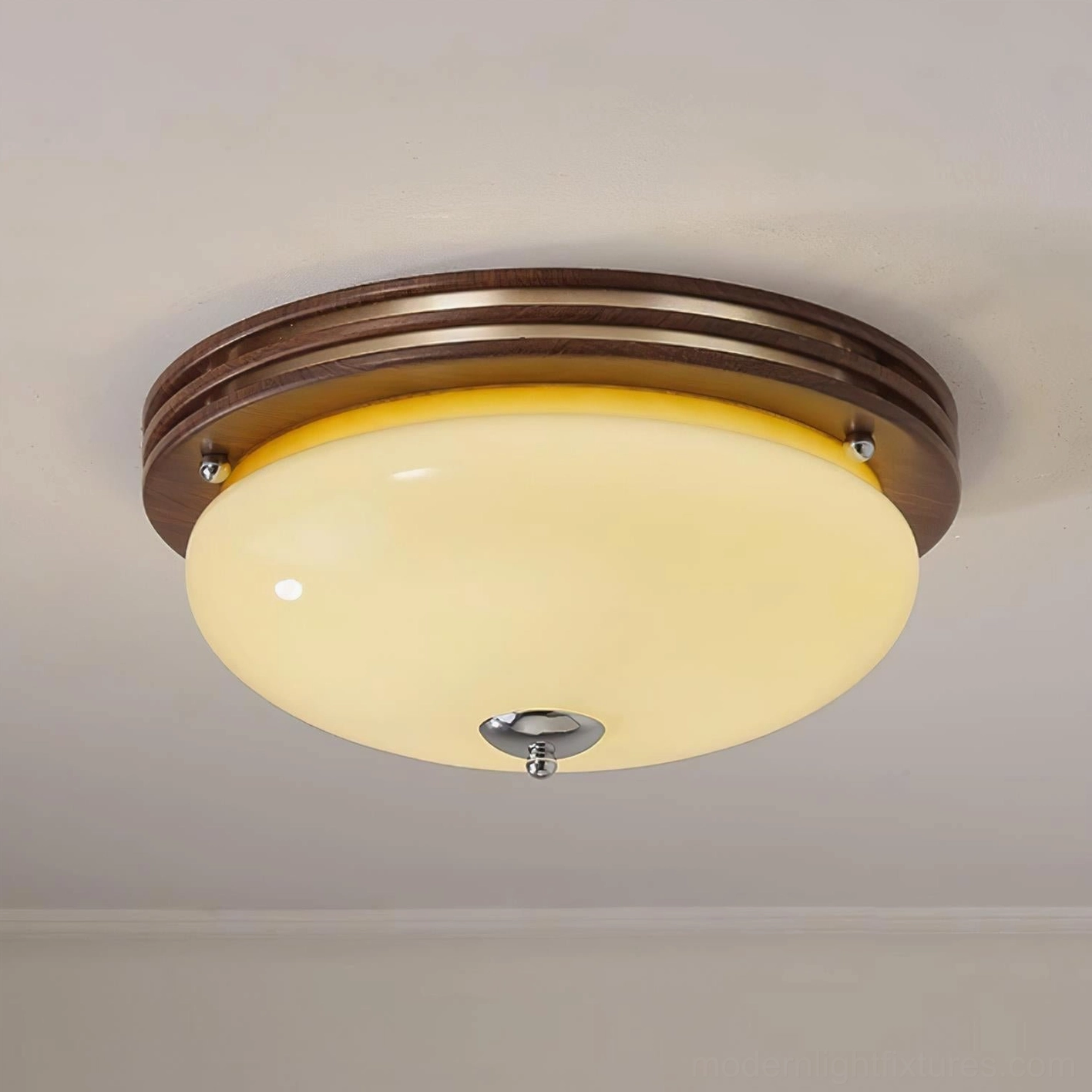 Amelia flush mount ceiling light low-angle view of layered dark wood trim and bright glass shade mounted on ceiling