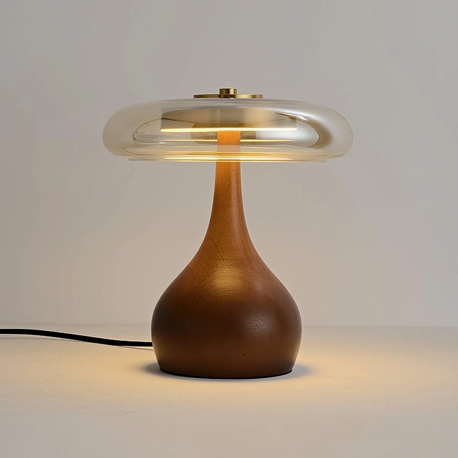 Andi table lamp Cognac amber glass with walnut wood base side angle