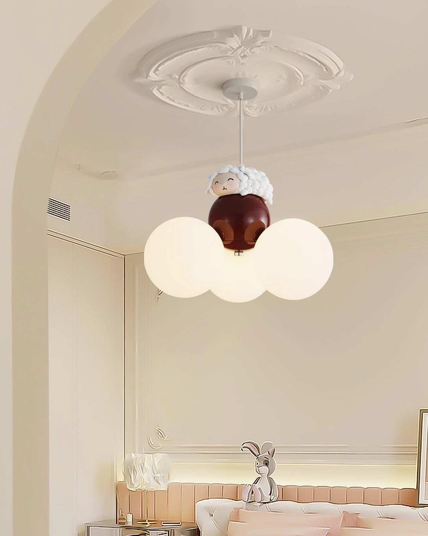 Cute animal pendant fixture detail showing frosted glass sphere and animal character design