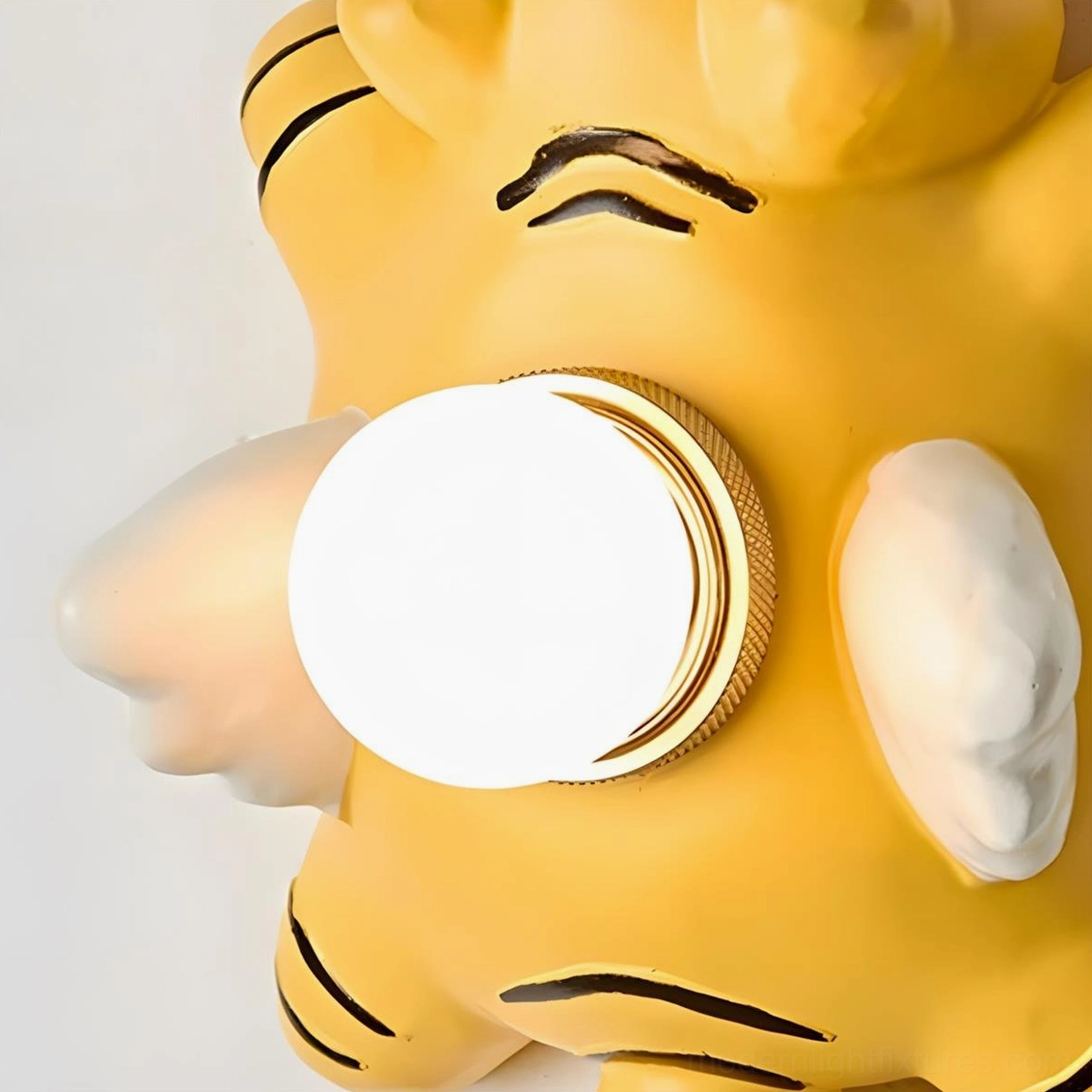 Dreamy paws wall sconce detail showing resin body and metal accents craftsmanship
