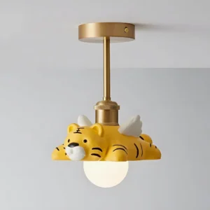 Cute animal ceiling light side profile showing brass metalwork and yellow tiger with wings on frosted glass diffuser