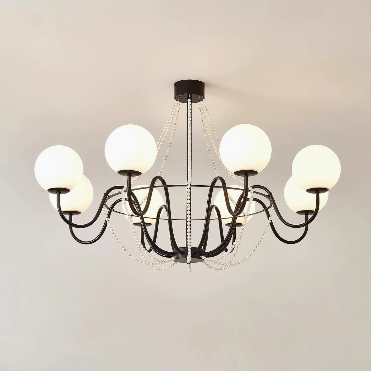 Arc Chandelier available in gold white and black finishes for diverse modern interior aesthetic applications
