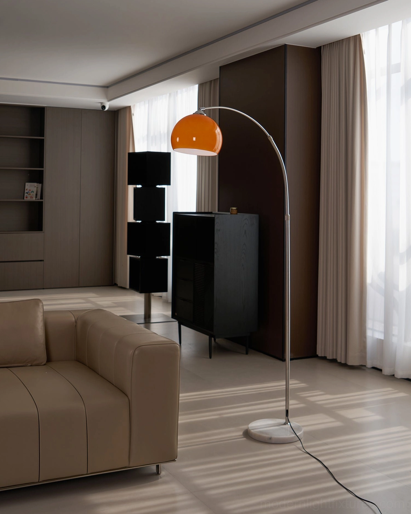 Contemporary arc floor lamp 80cm diameter base showing stability and proportion