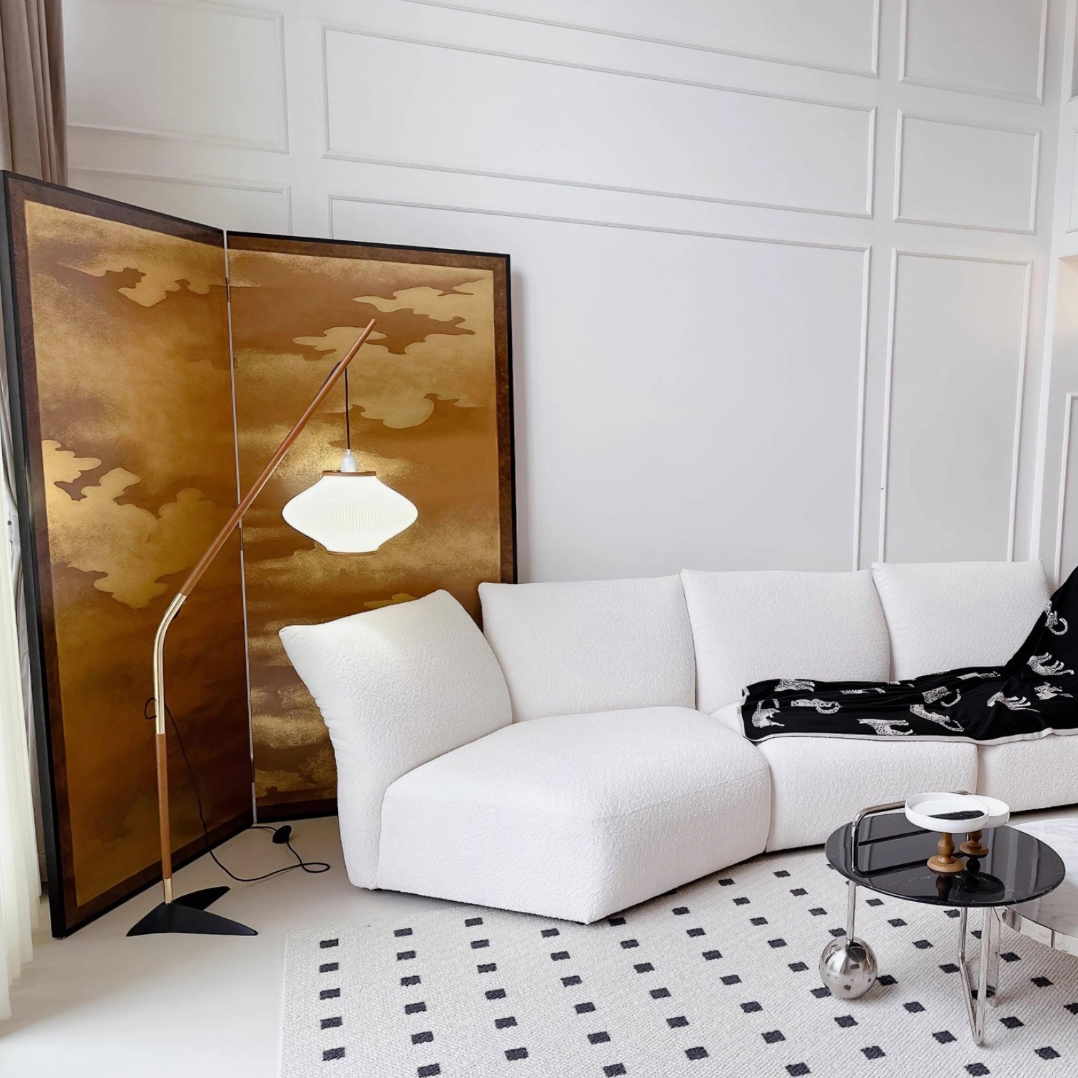 Arc floor lamp brightening bedroom reading nook with warm illumination and comfortable ambiance