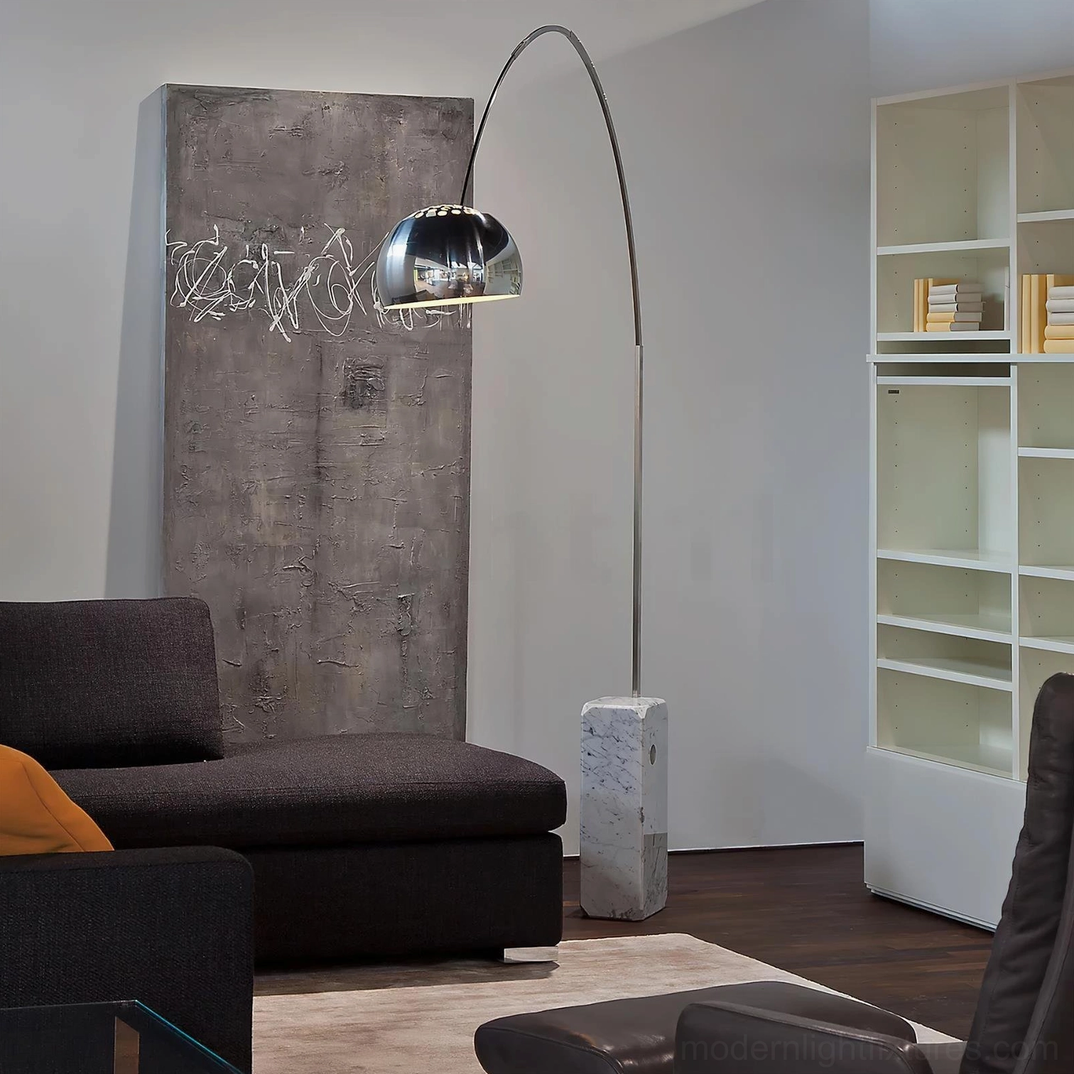 Arc floor lamp with silver frame positioned in contemporary home office space