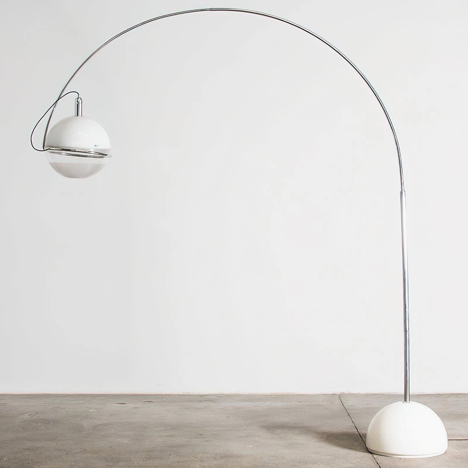 Contemporary arc floor lamp left front angle showing white base and sweeping chrome curved arch design