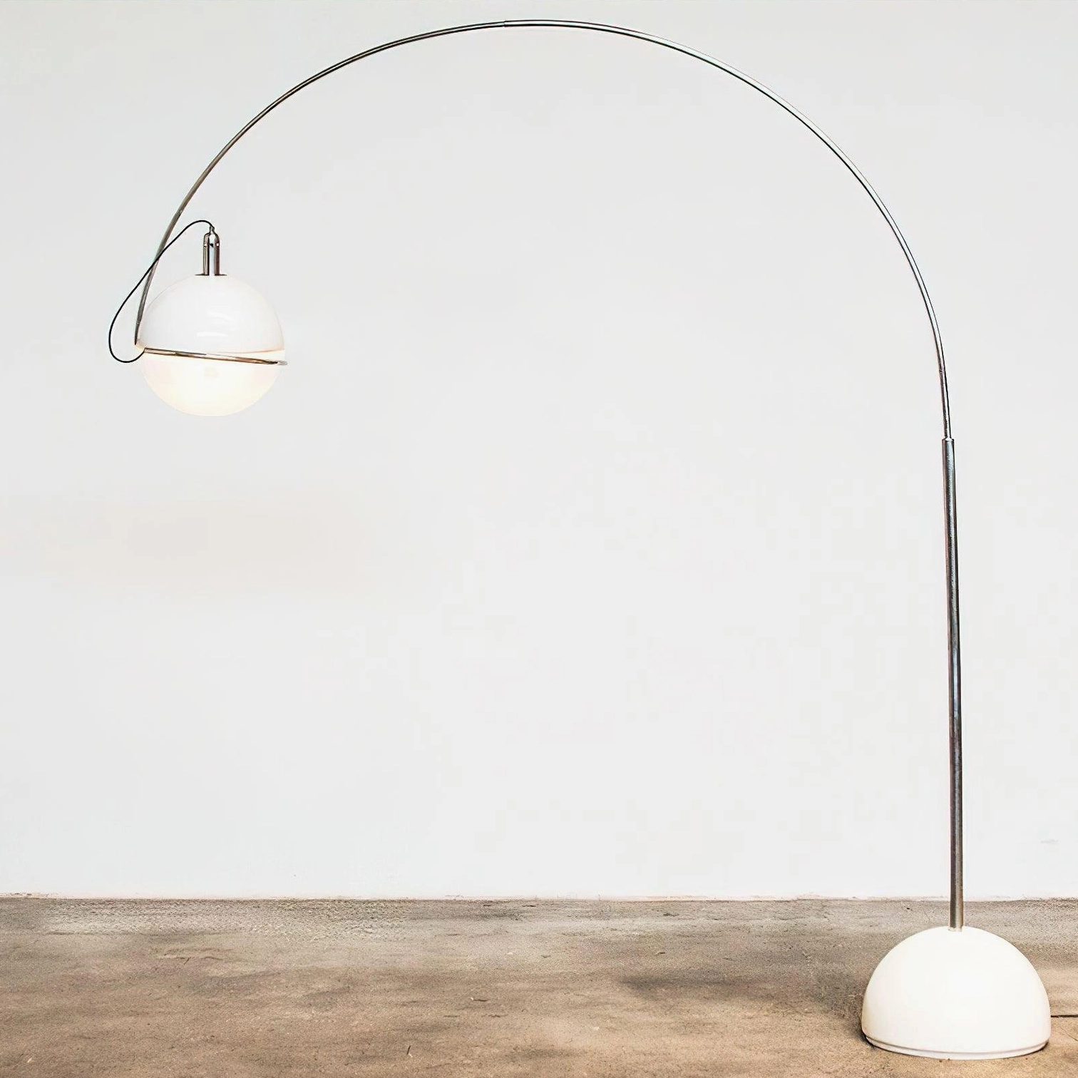 Modern arc floor lamp front view showing polished chrome pole and frosted white dome shade on round base