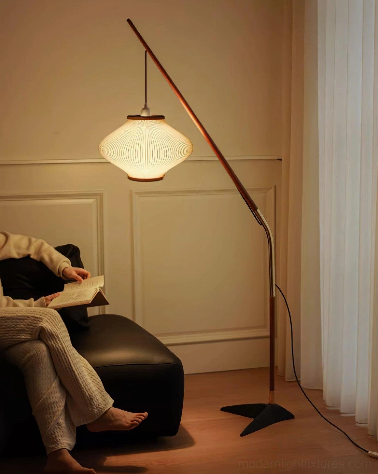 Arc floor lamp artistic angle showing curved arc arm and minimalist geometric design
