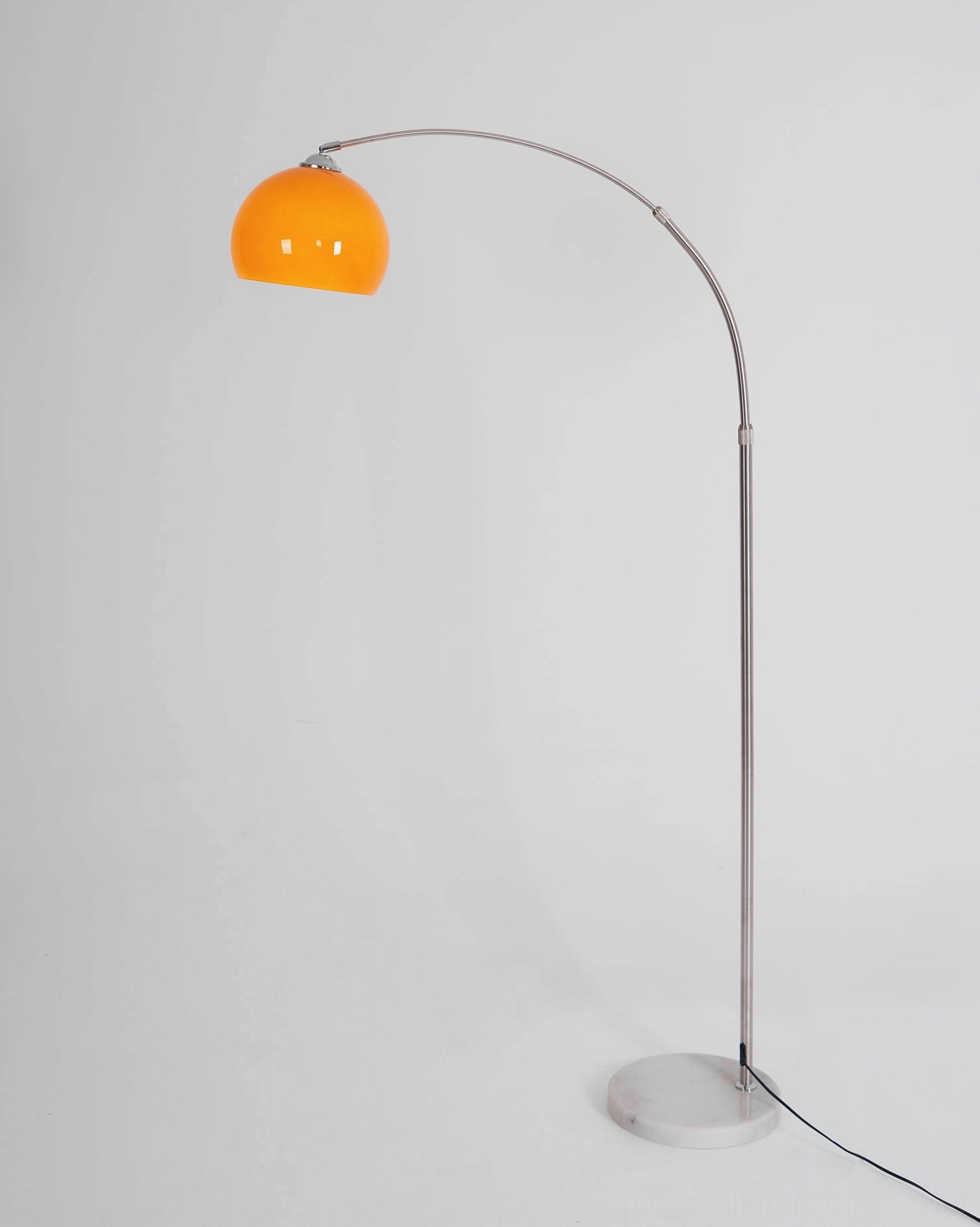 Modern arc floor lamp graceful arched silhouette geometric precision design