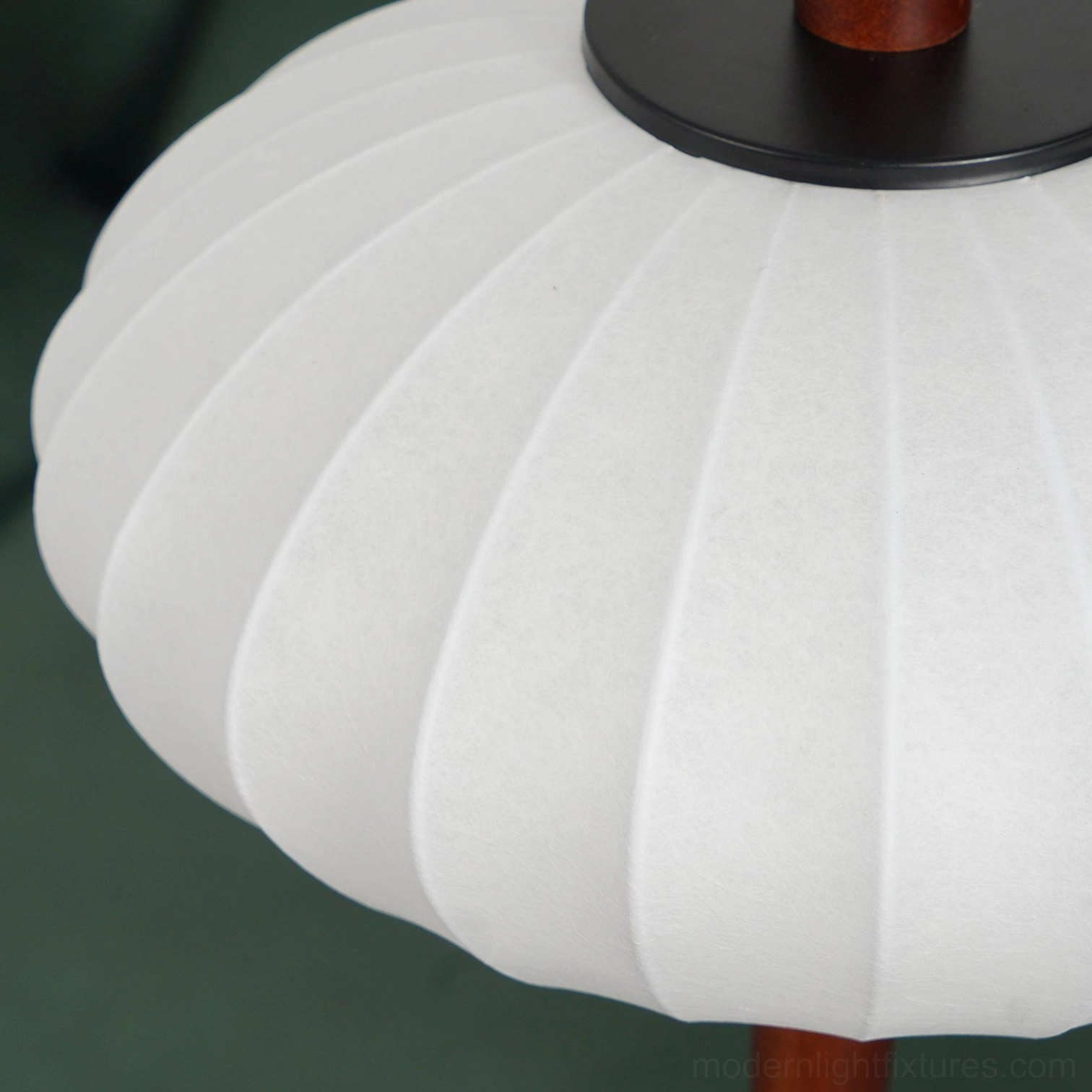 Arc floor lamp with handcrafted wood frame and soft fabric shade side angle