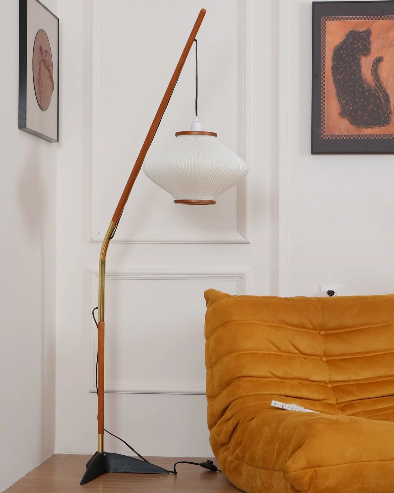Mid-century arc floor lamp installation perspective showing practical room placement and scale