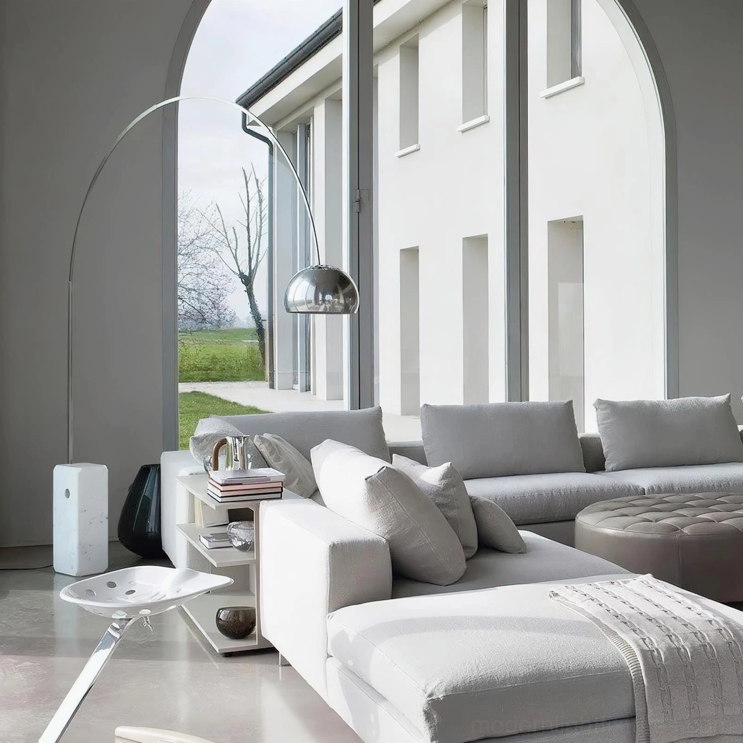 Contemporary arc floor lamp with marble base detail and silver stainless steel frame
