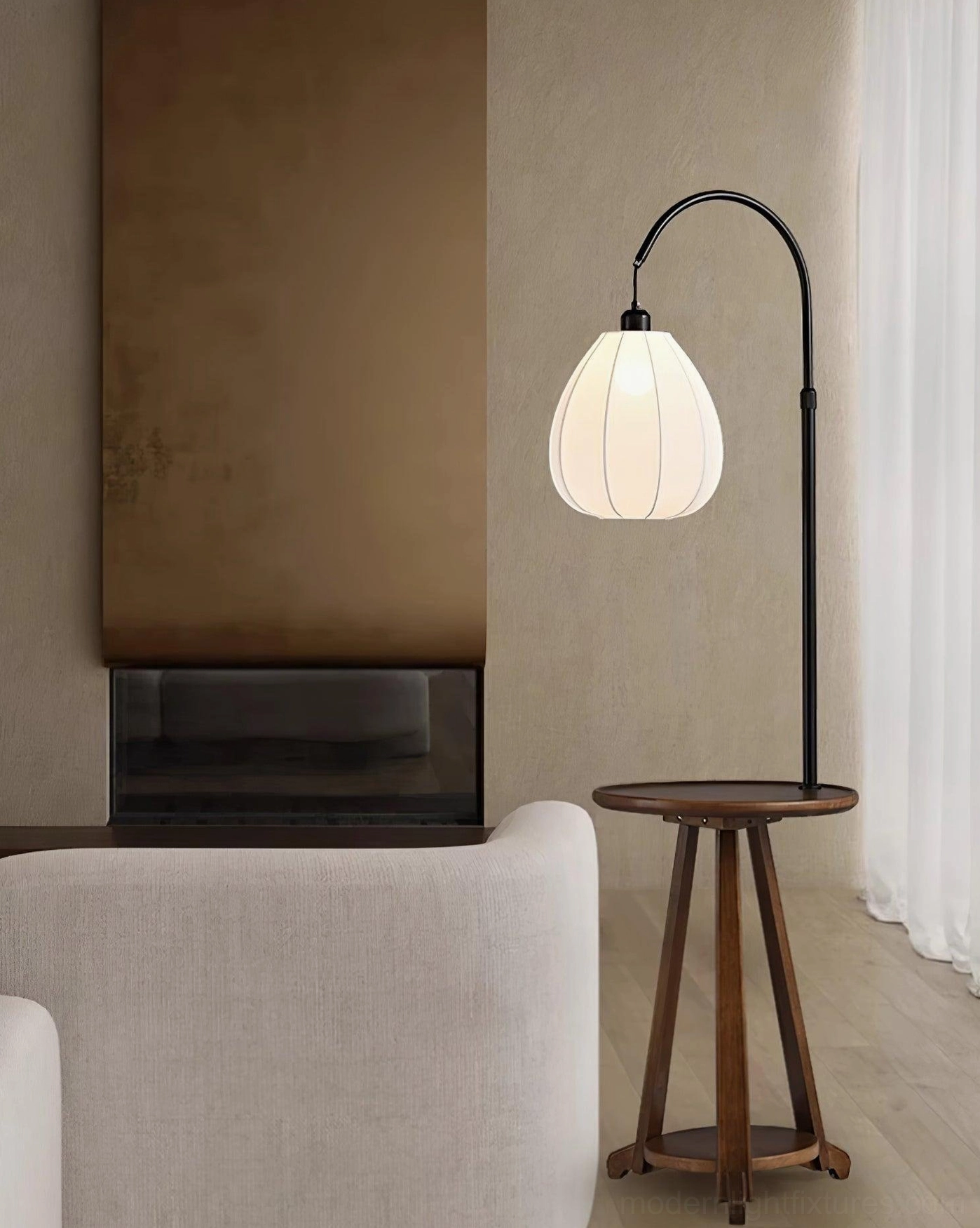 Arc floor lamp with side table in modern living room, fireplace feature wall, neutral interior design, sofa