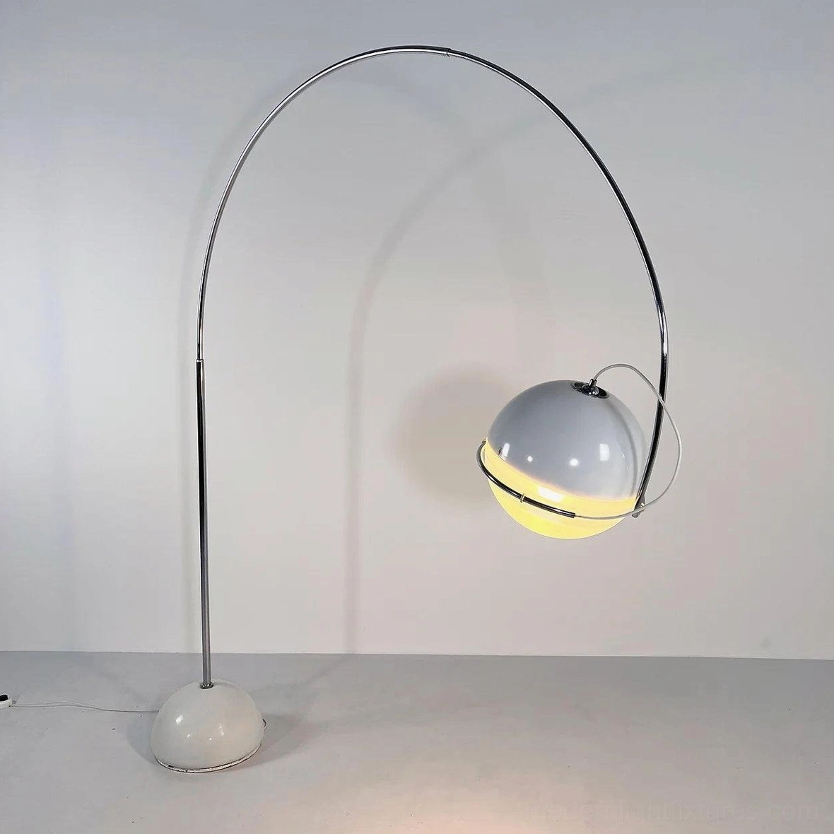 Arc floor lamp right side profile with curved chrome frame and spherical lamp shade detail