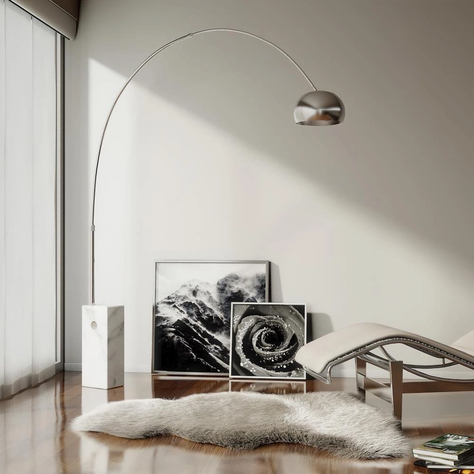 Modern arc floor lamp round pipe variant showing sculptural metal silhouette
