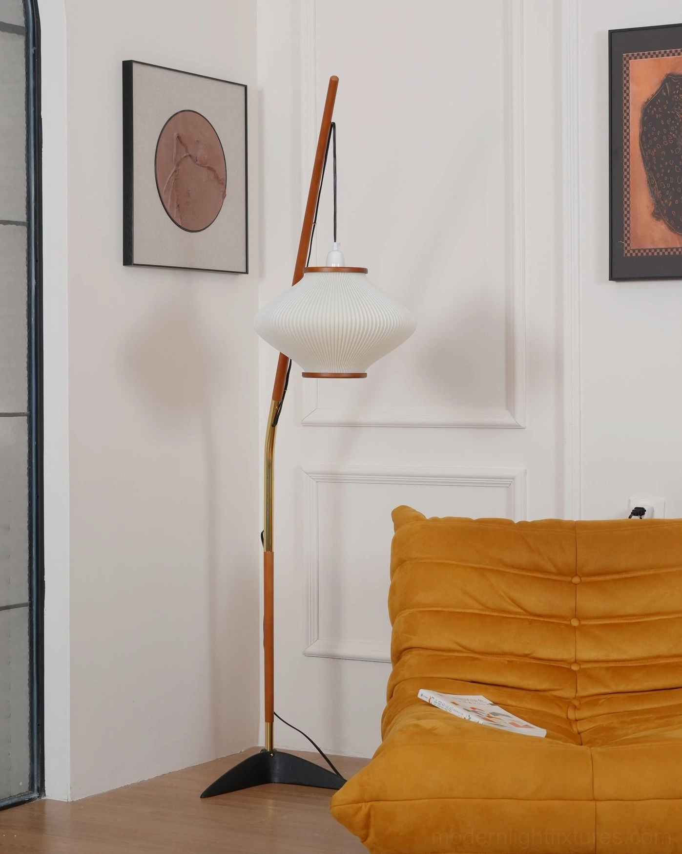 Arc floor lamp sculptural form against neutral backdrop, design appreciation perspective