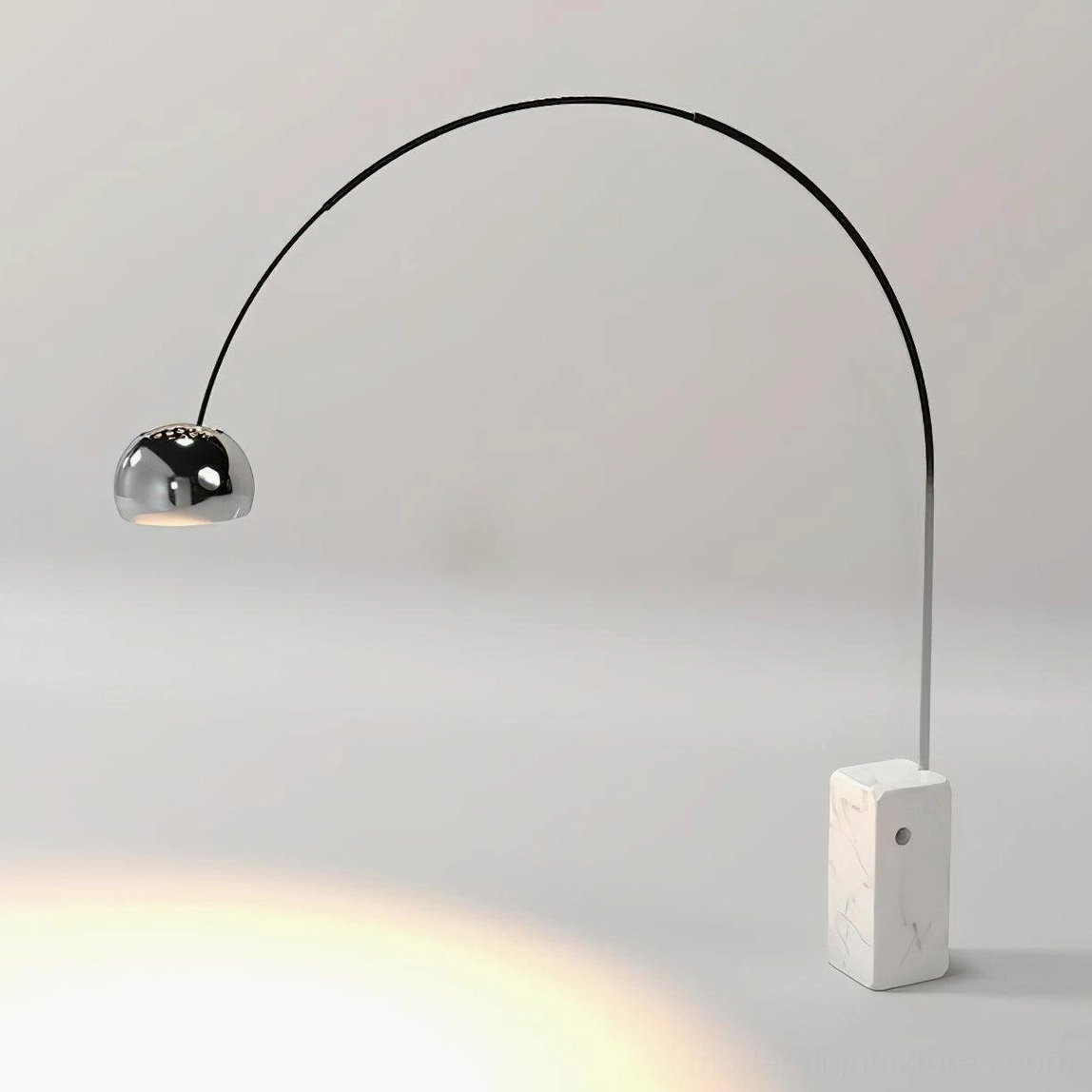 Modern arc floor lamp side angle showing elegant curve and marble base proportion