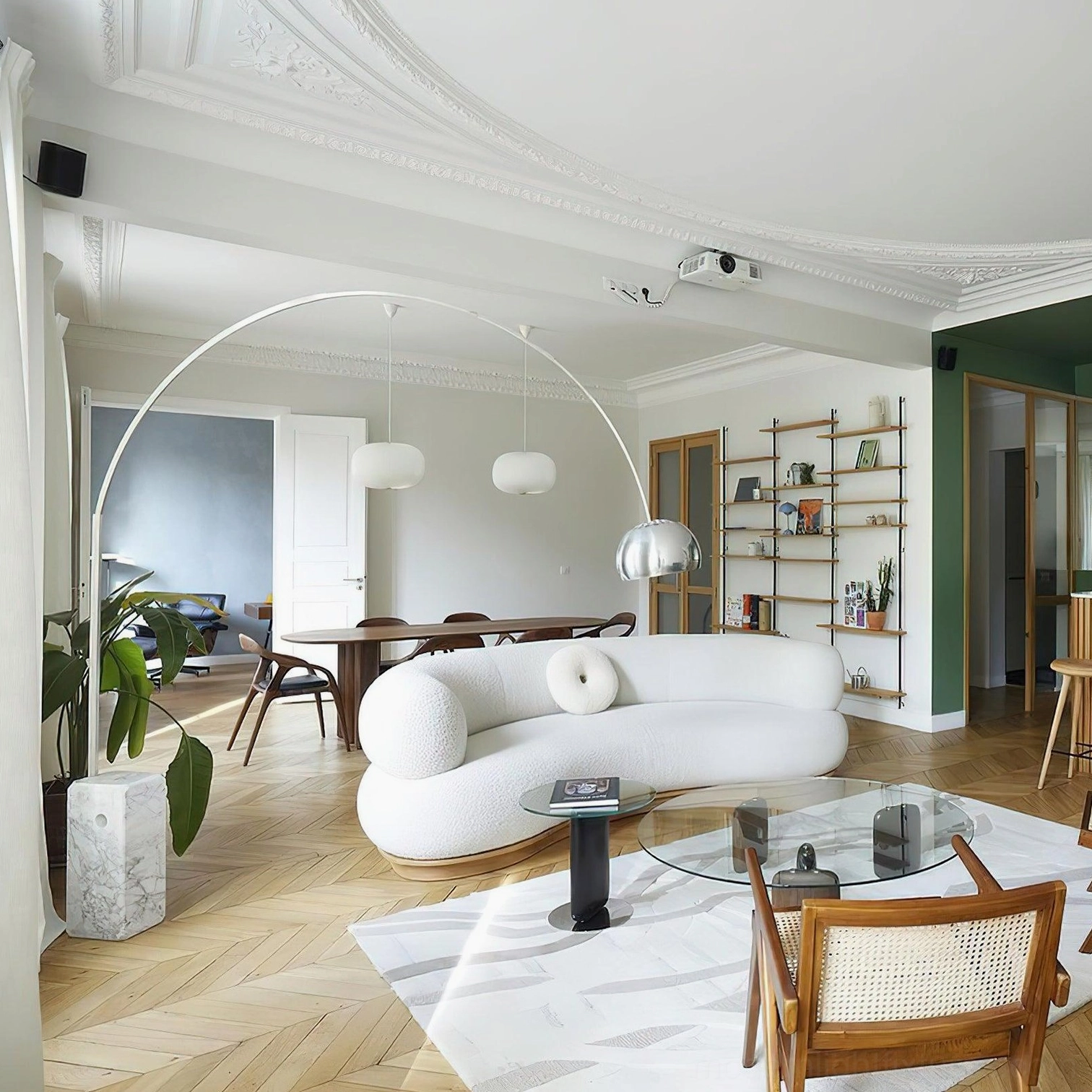 Arc floor lamp with silver plated shade reflecting warm non-glaring light