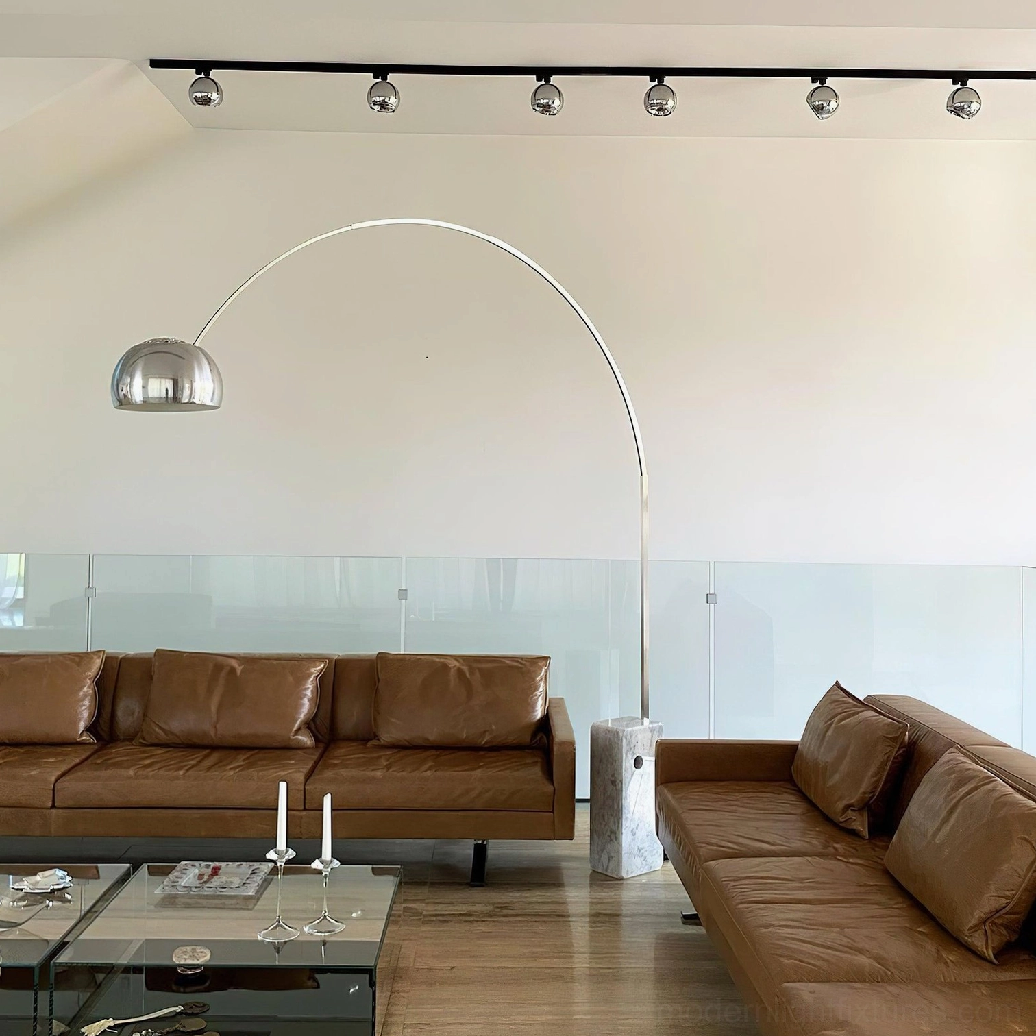 Arc floor lamp stainless steel frame showing quality craftsmanship and finish