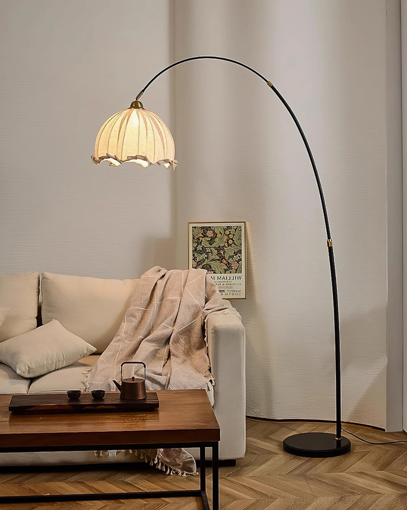 Arc floor lamp with elegant fabric shade in modern home interior setting