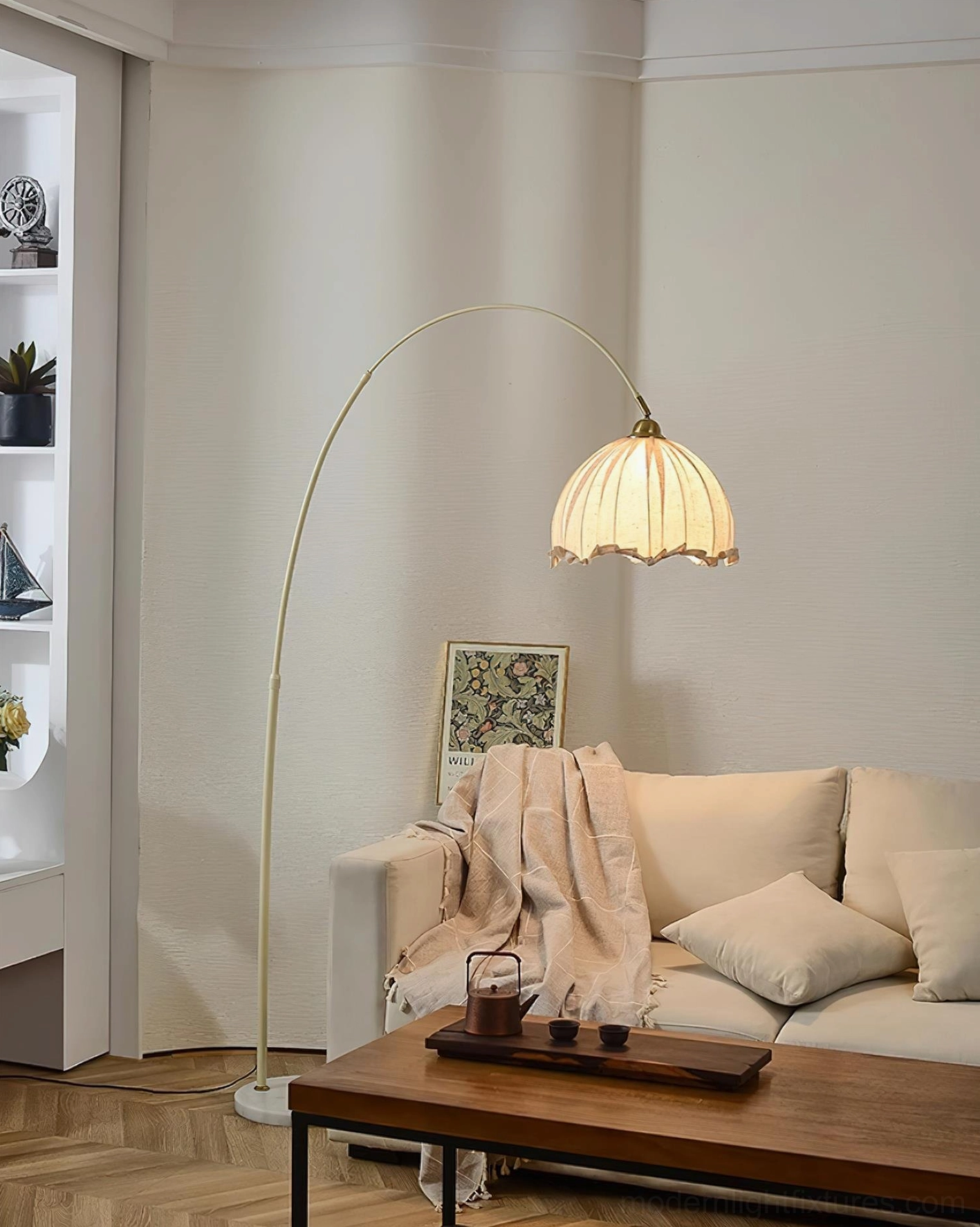 Arc floor lamp sculptural arch design creating visual interest in minimalist space