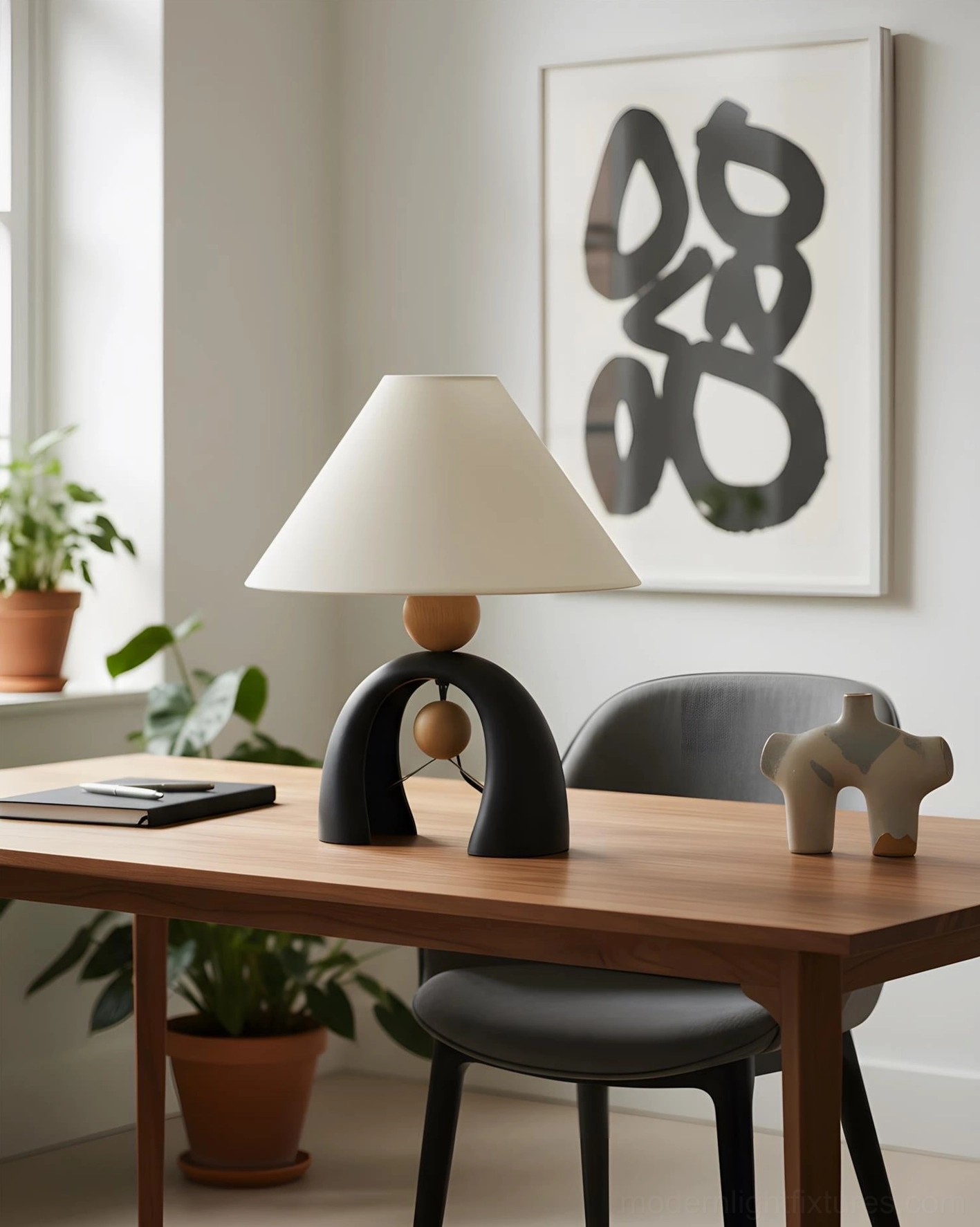 Contemporary arch lamp providing ambient lighting on dining room wooden table with potted plant and abstract wall art