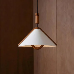 Japandi pendant light with walnut wooden arch and white fabric shade against dark wood wall
