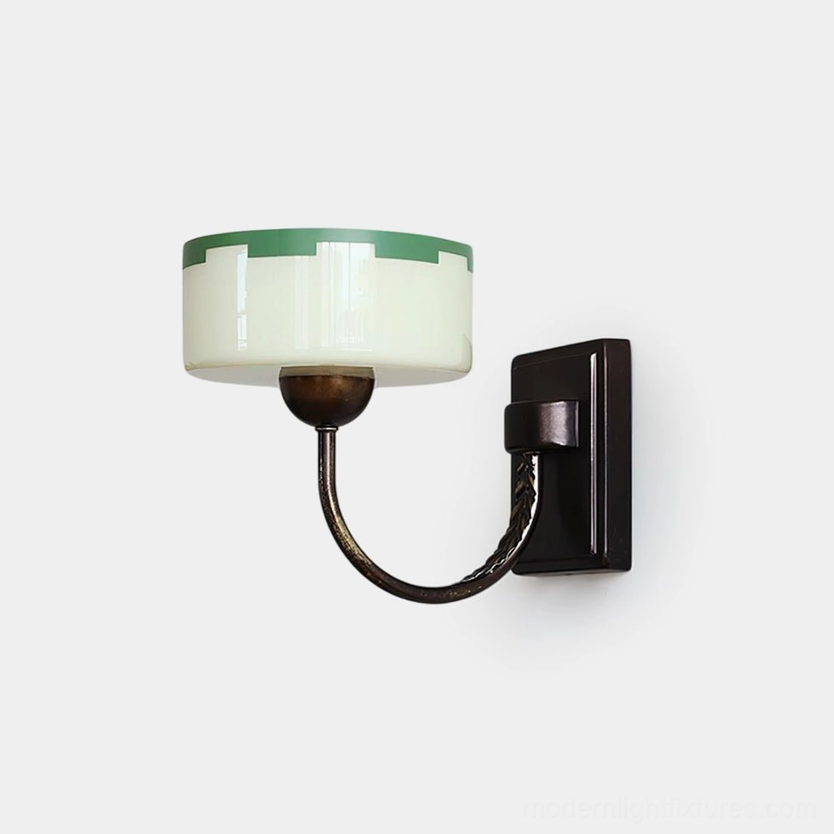Art Deco green glass wall sconce with bronze metal arm, front studio view on white background